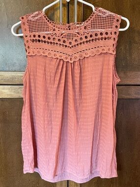 By the River sleeveless blouse with crochet neck line.